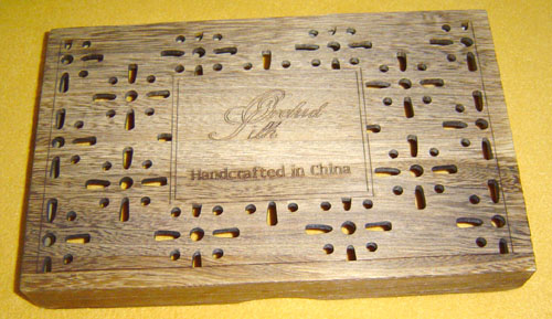 木盒激光雕花沖孔