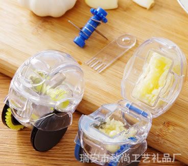 工具滾輪式切蒜器 手動(dòng)碎蒜器 快速蒜泥器 磨蒜器蒜蓉器